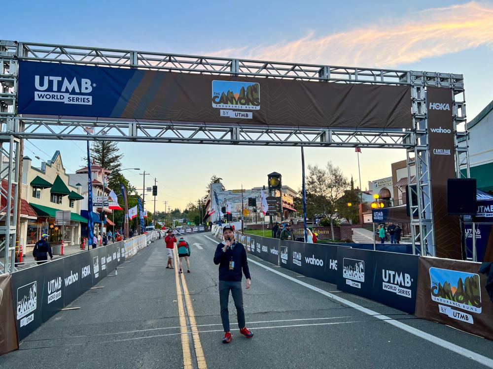 Announcing under the finish gantry at The Canyons Endurance Runs by UTMB